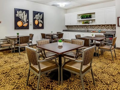 Bright interior dining area with tables and chairs