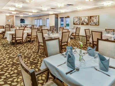 Bright dining room with neatly set tables