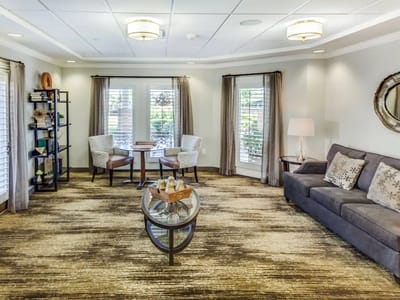 Bright common area with seating and decor