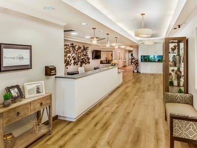 Interior view of a lobby with a reception desk