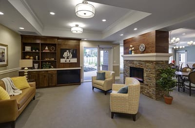 Cozy common area with seating and a fireplace