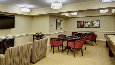 Interior of a common area with seating and game tables