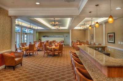 Bright and inviting dining room with tables and chairs