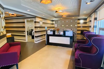 Modern lobby area with seating and reception desk