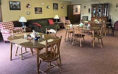 Interior view of a cozy common area with seating