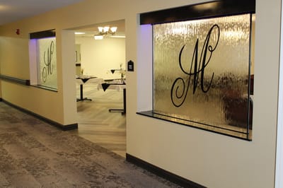Interior view of a dining area with decorative glass panels