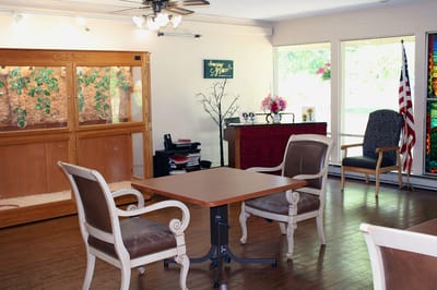 Comfortable common area with seating and natural light