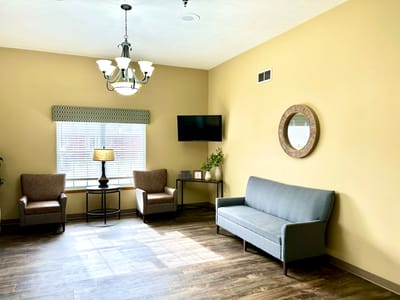 Cozy common area with seating and warm lighting