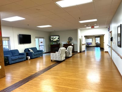 Common area with seating and television