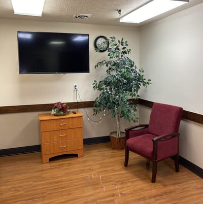 Cozy corner of a common room with seating and decor