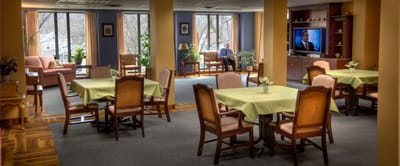 Common area with residents sitting and dining