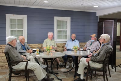 Residents enjoying a social gathering in a common area