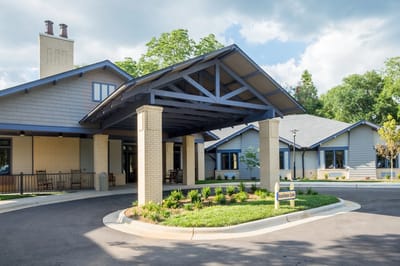 Exterior view of the facility's entrance with landscaping