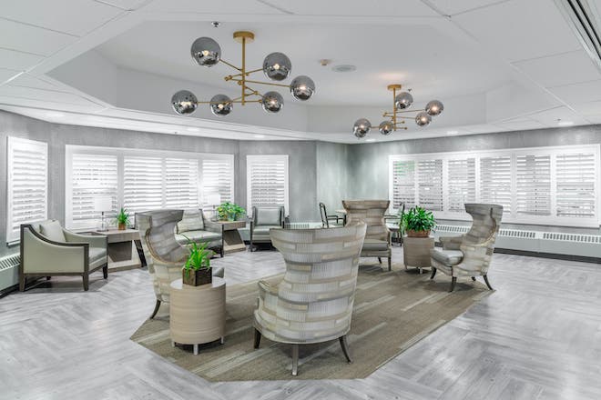 Common area with comfortable seating and plants
