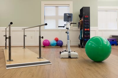 An interior view of a fitness area with equipment