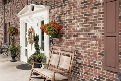 Entrance with floral decorations at White Oak Manor Columbia