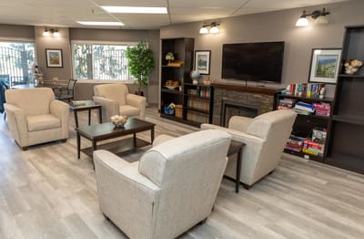 Common area with seating and a television