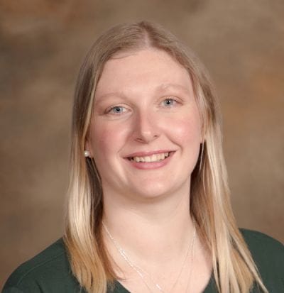 Dove Healthcare – Superior, Nursing Home in Superior, WI — Smiling woman with long blonde hair in a dark top