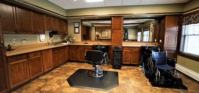 Interior view of a salon area with wheelchairs
