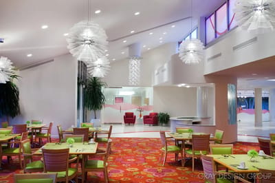Bright dining area with colorful decor and furniture