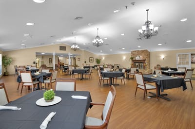 Dining room with tables set for meals