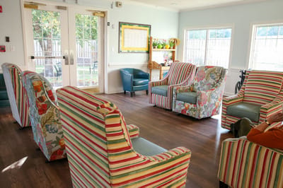 Bright common area with colorful furniture