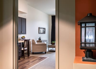 View into a well-furnished resident room