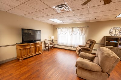 Common area with seating and television