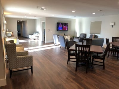 Common area with comfortable seating and a TV