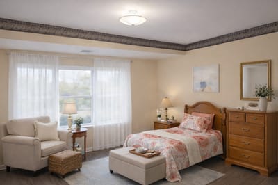 Cozy resident room with natural light and furnishings