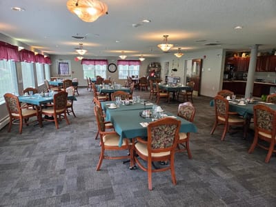 Dining room with tables set for meals