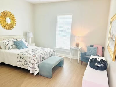 Cozy interior of a private resident room with a bed and decor