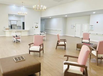 Bright common area with chairs and modern decor