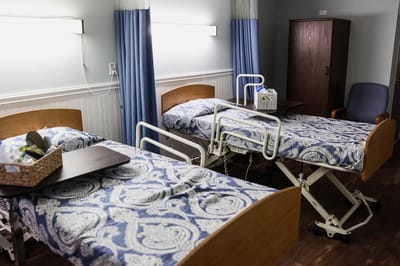 Interior view of a resident room with two beds