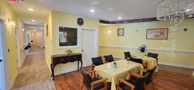 Bright common area with tables and chairs