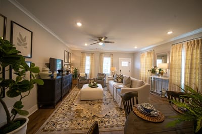 Bright common area with comfortable furniture and decor