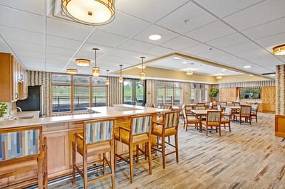 A spacious common area with seating and natural light