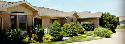 Exterior view of a landscaped area of the facility