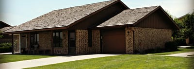 Exterior view of a single-story facility building
