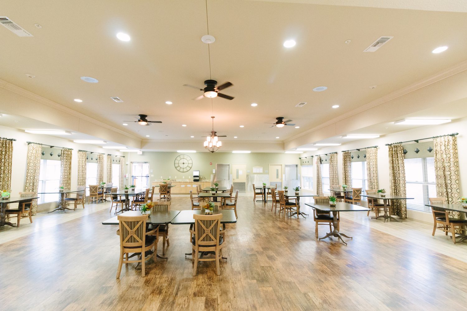 Bright dining room with wooden tables and chairs