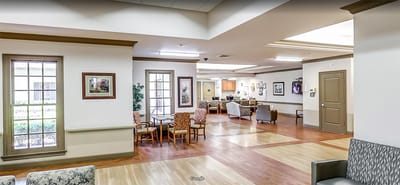 A bright common area in the facility with seating