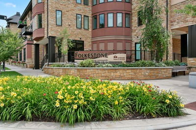 Exterior view of Folkestone with landscaped flowers
