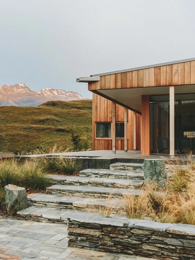 Exterior view of a modern building with stone steps