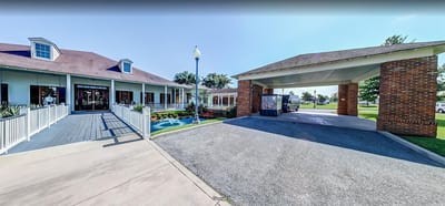 Front view of Camelot Brookside entrance and drive-through