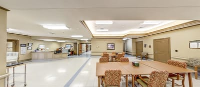 Interior view of a common area with dining tables