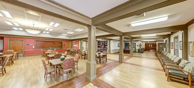 Common area with seating and bookshelves