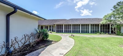 Walkway in the garden area of the facility