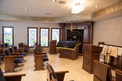 Interior view of a serene prayer room with seating