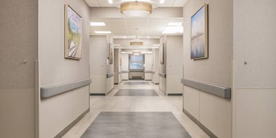 Bright hallway with artwork and modern fixtures