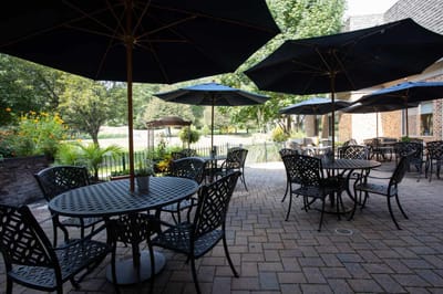 Outdoor seating area with umbrellas and tables